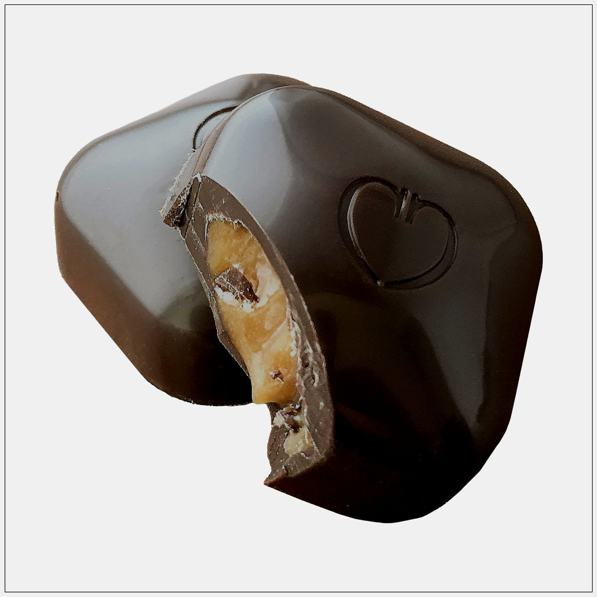 Rich dark chocolate bites filled with smooth salted caramel, perfect for a sweet and salty indulgence - Alive Herbals