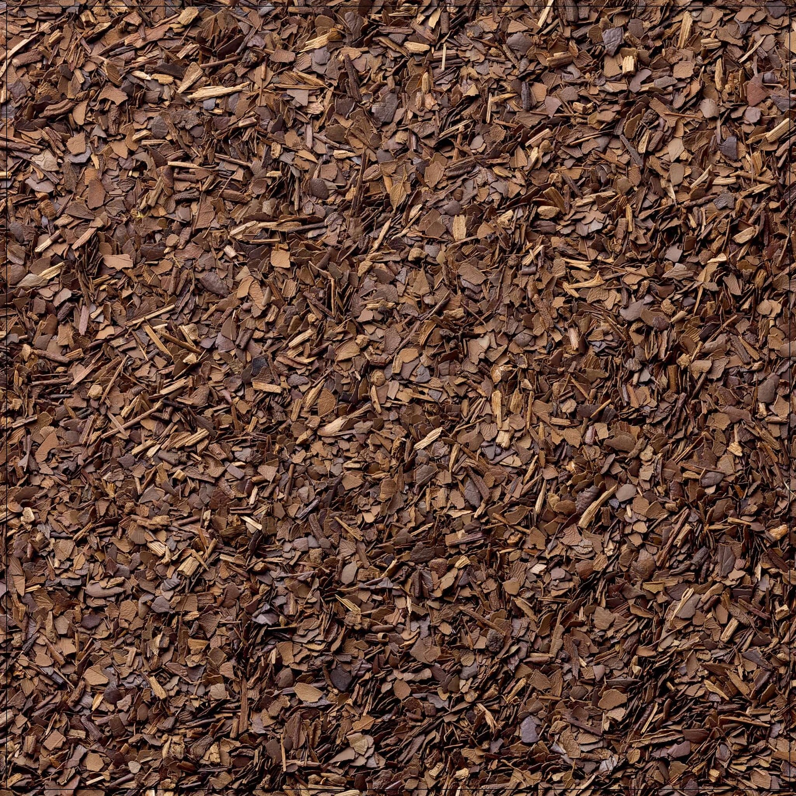 Cup of roasted yerba mate tea with dried leaves on a wooden table, rich aroma rising in warm light