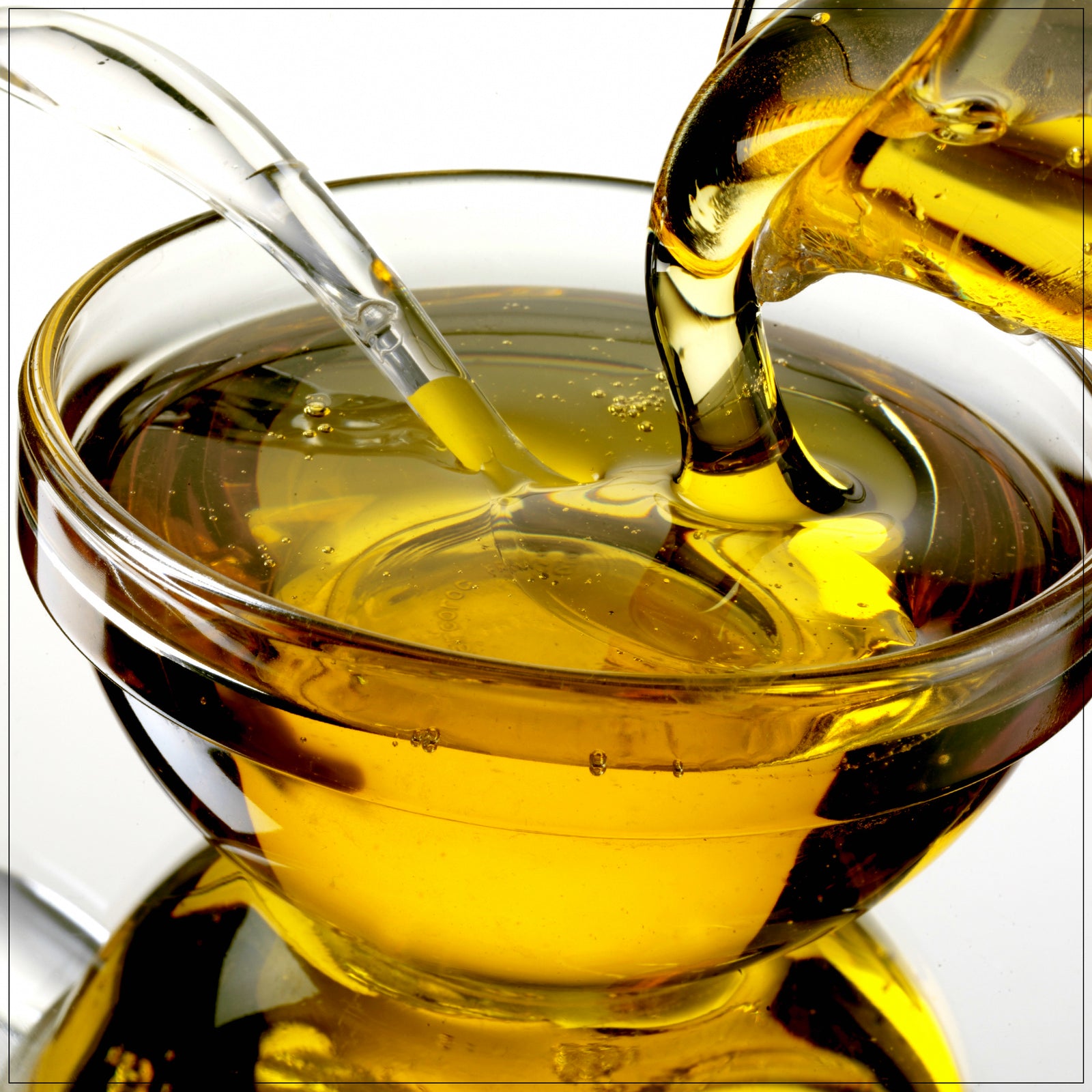 Raw agave nectar in glass bottle, natural sweetener for beverages, baking, and cooking.