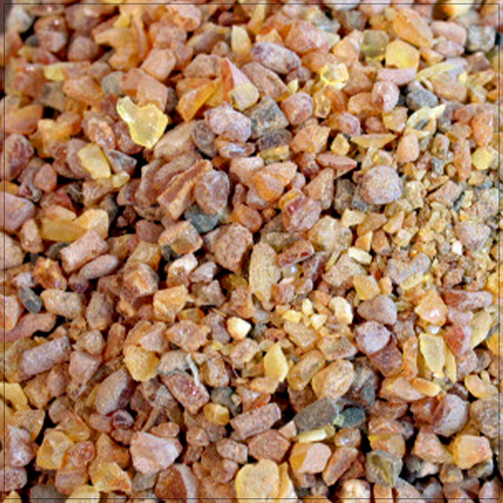 Golden amber resin beads with natural inclusions, used in jewelry and holistic wellness.