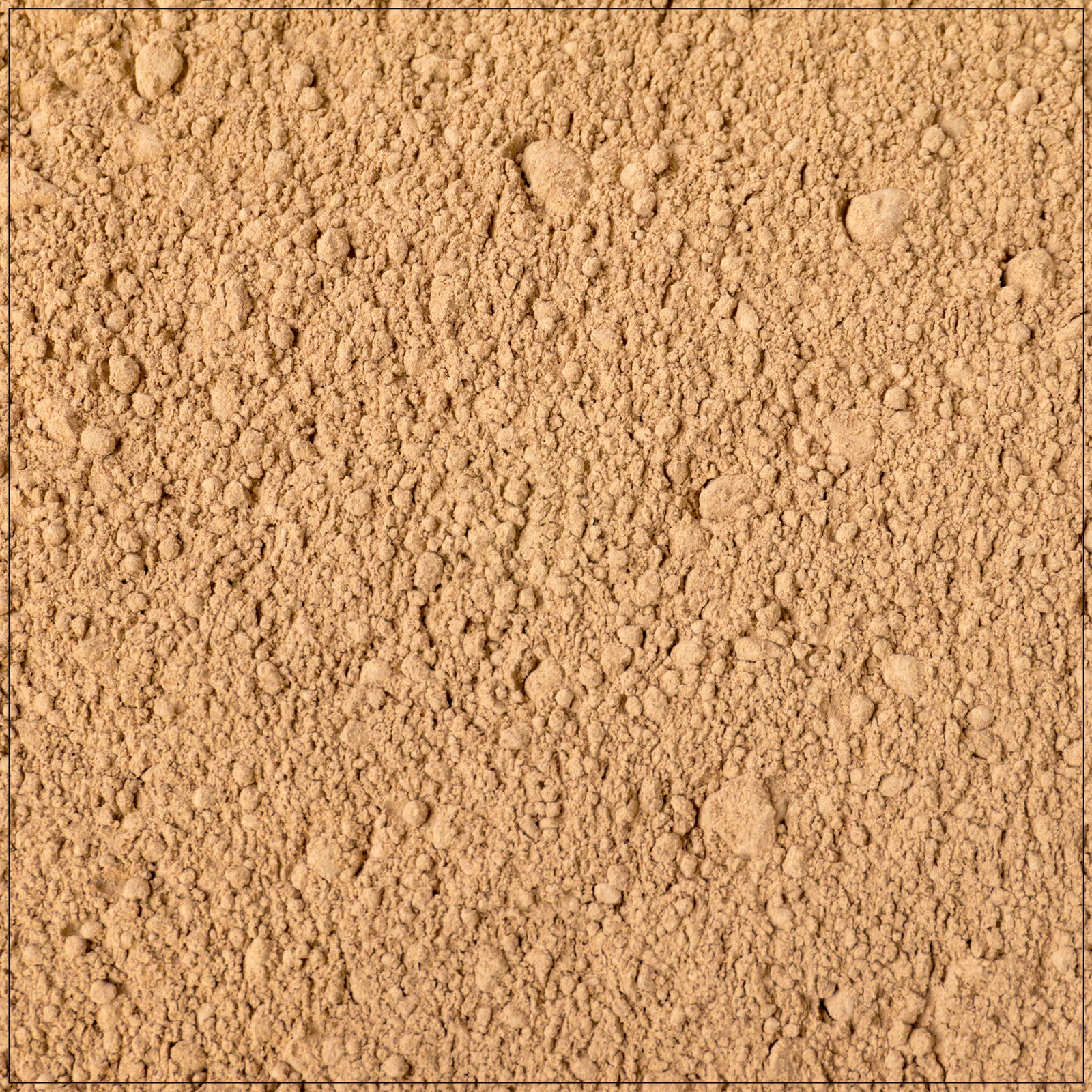 Natural Amla powder in a wooden bowl with fresh Indian gooseberries on a rustic background