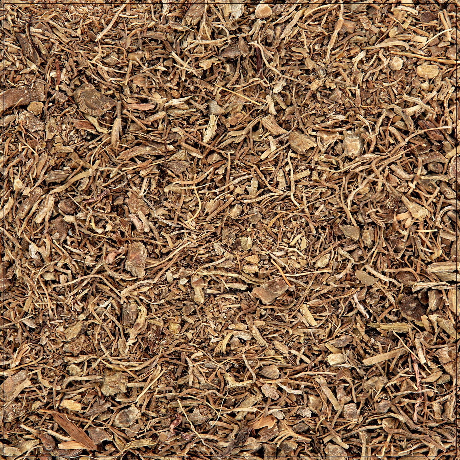 Dried Blue Cohosh Root pieces on a white background, used in traditional herbal wellness remedies.