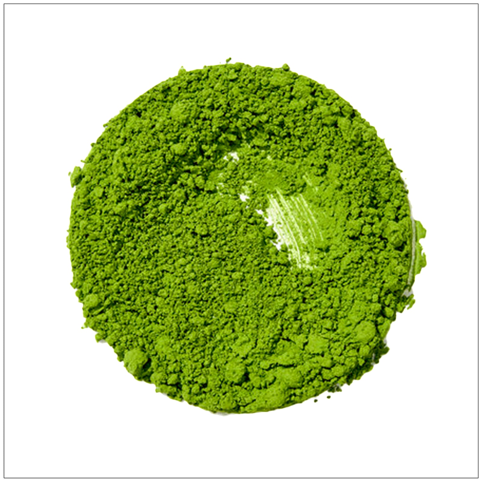 Vibrant green ceremonial matcha tea in a traditional chawan bowl with bamboo whisk on a wooden surface.