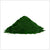 Chlorella Powder in a spoon with green smoothie—rich in chlorophyll, protein, and essential nutrients.