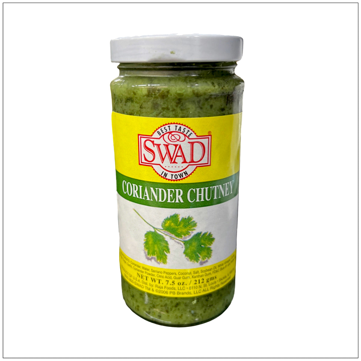 Fresh coriander chutney in a white bowl with vibrant green color, ideal as a dip or spread for Indian dishes.
