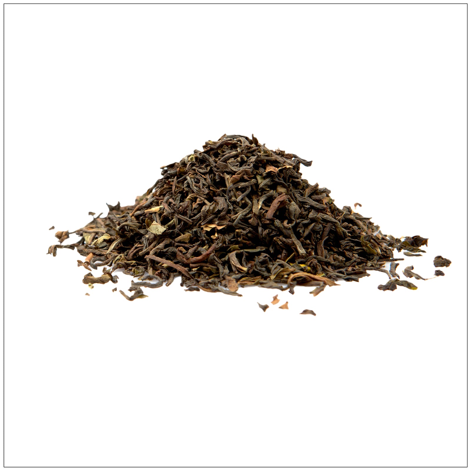 Loose-leaf Darjeeling tea in a wooden spoon, showcasing its golden color and fine texture on a rustic background.