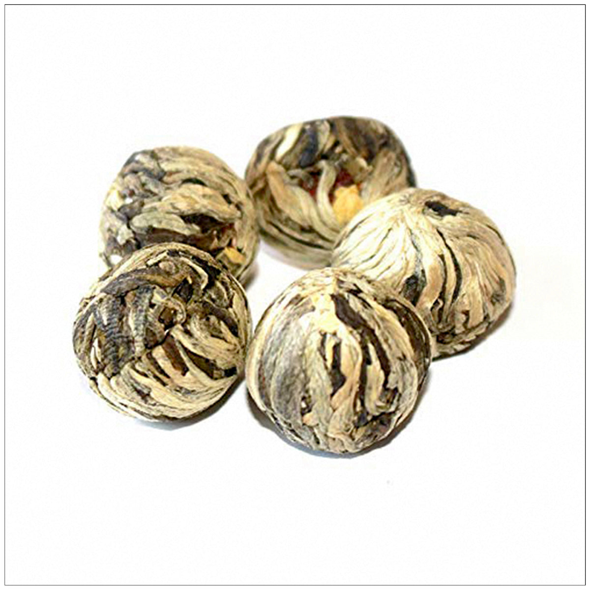 Elegant East Beauty Blooming Tea flower unfurls in hot water for a stunning and soothing tea experience.