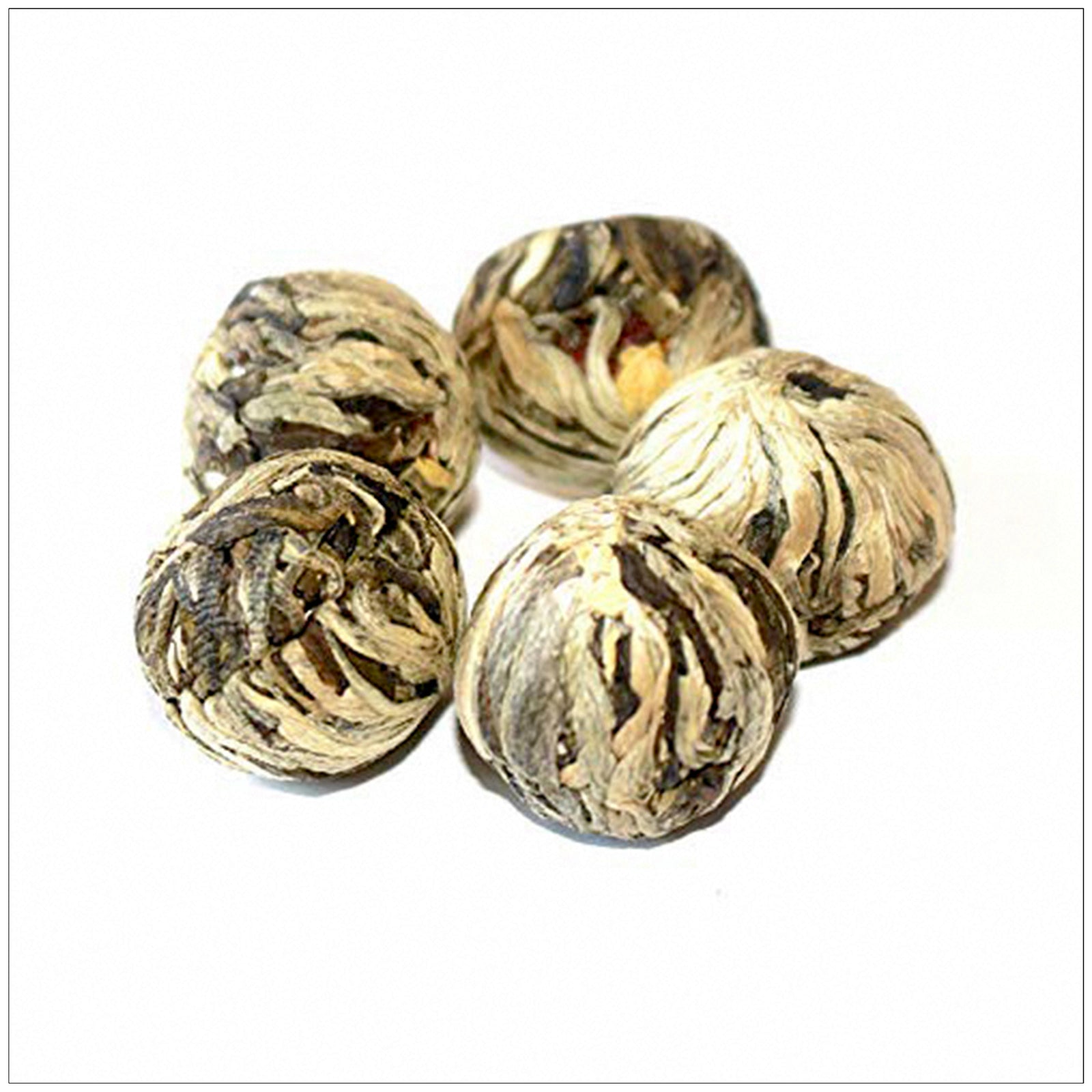 Elegant East Beauty Blooming Tea flower unfurls in hot water for a stunning and soothing tea experience.