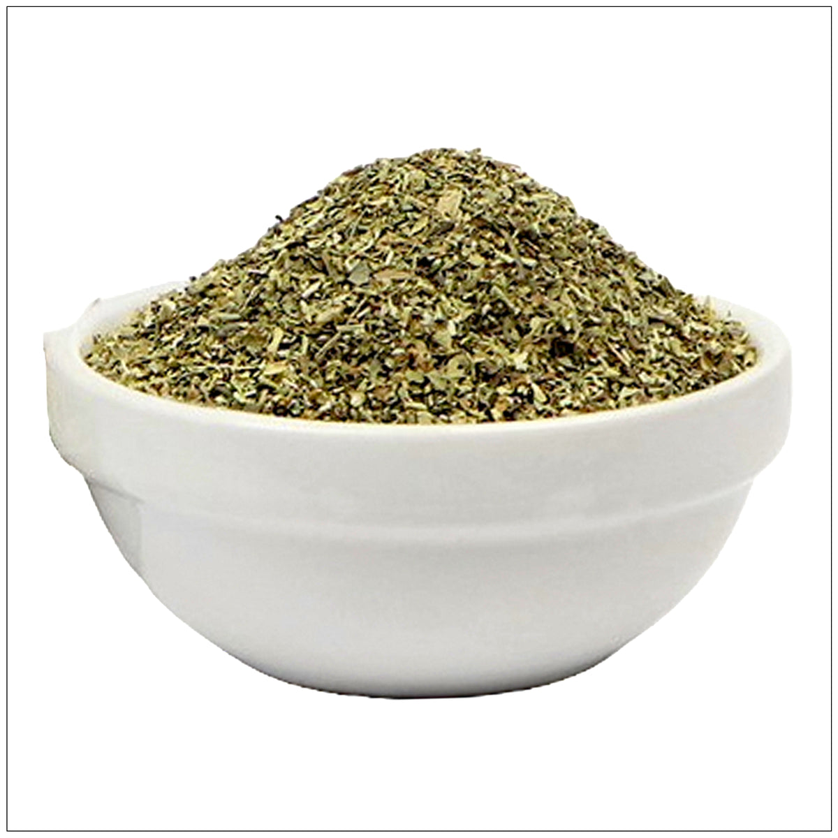Aromatic Italian seasoning mix with basil, oregano, and thyme in a clear spice jar on a kitchen counter.