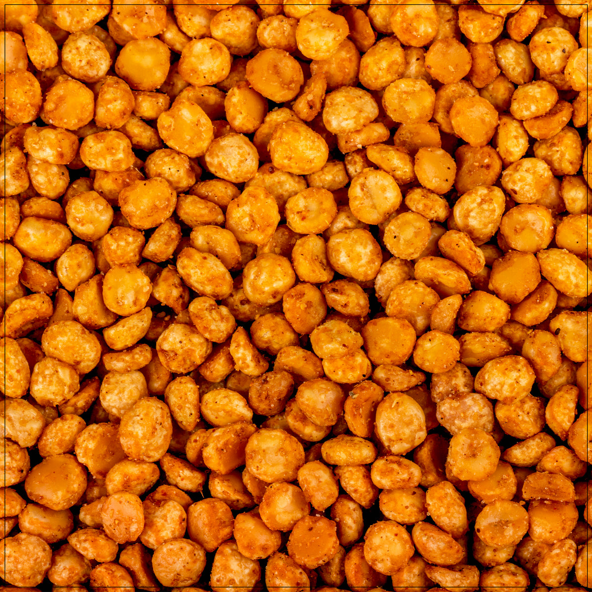 A bowl of chana masala with chickpeas in a spiced tomato-based curry, garnished.