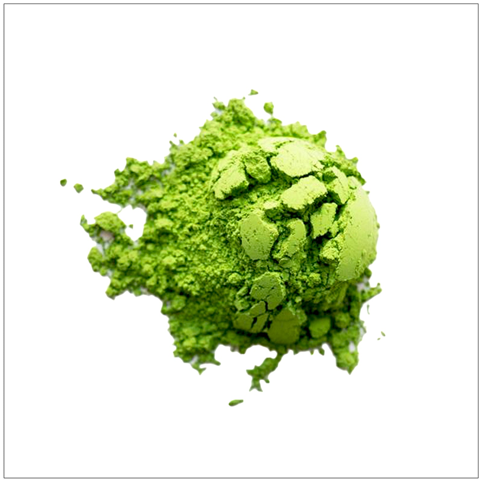 Cup of vibrant green matcha tea on a wooden table with a bamboo whisk and powdered matcha in a ceramic bowl.