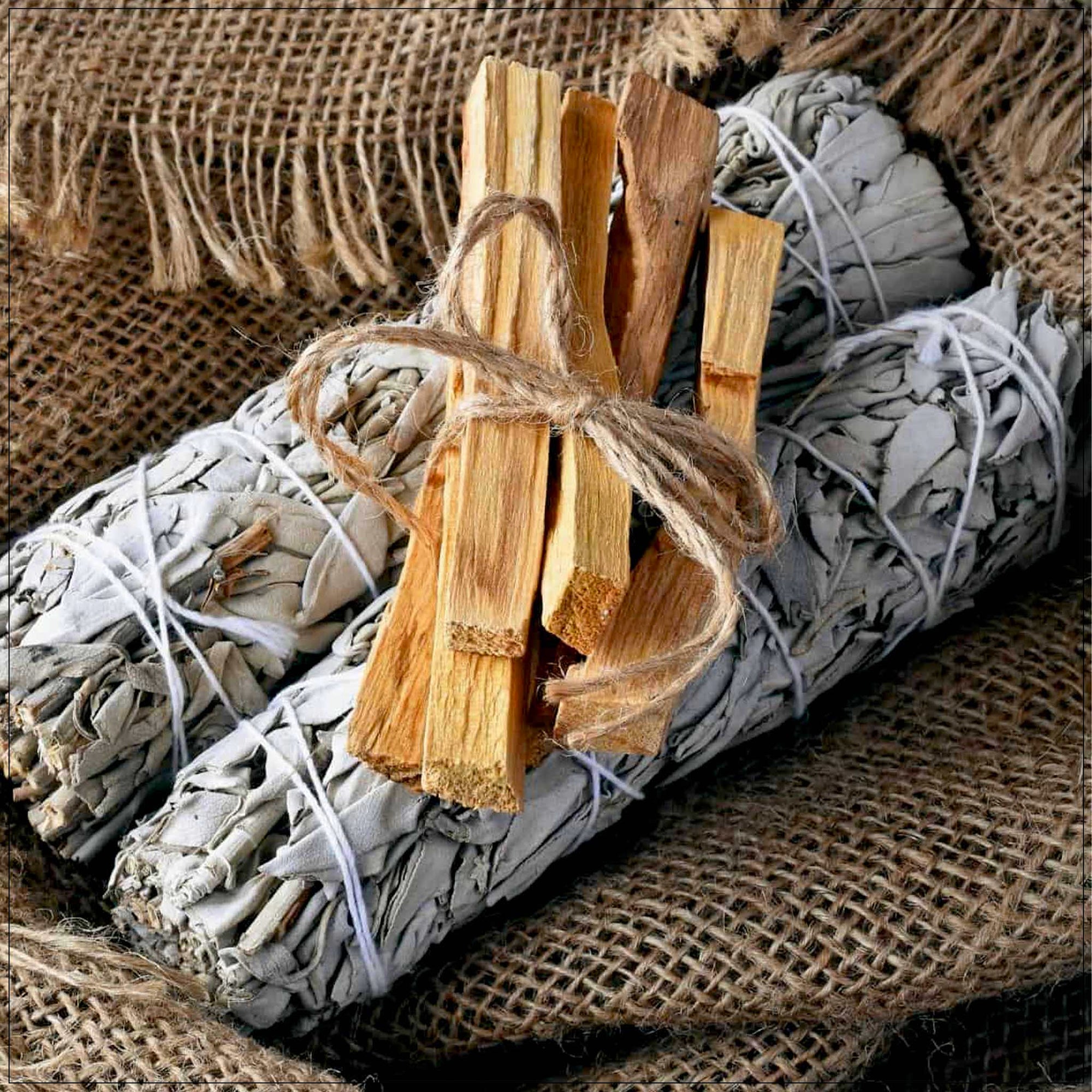 Smudge bundle of Palo Santo and sage for cleansing, meditation, and natural energy purification rituals.
