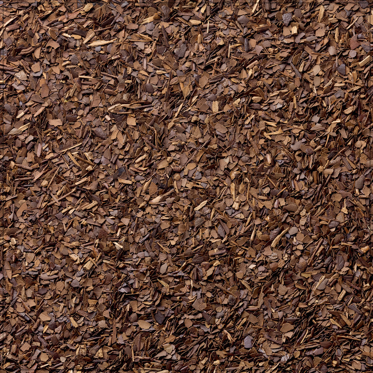 Cup of roasted yerba mate tea with dried leaves on a wooden table, rich aroma rising in warm light