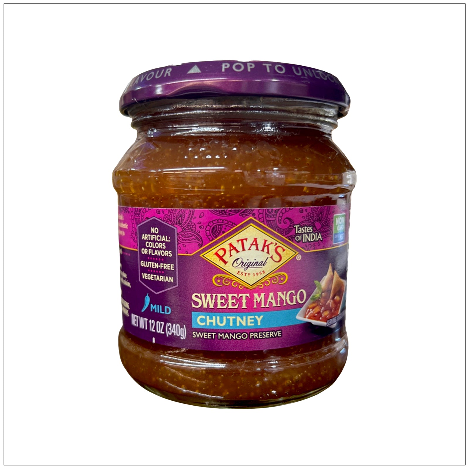 Sweet Mango Chutney Mild in glass jar – a deliciously tangy condiment perfect for snacks, meats, or Indian dishes.